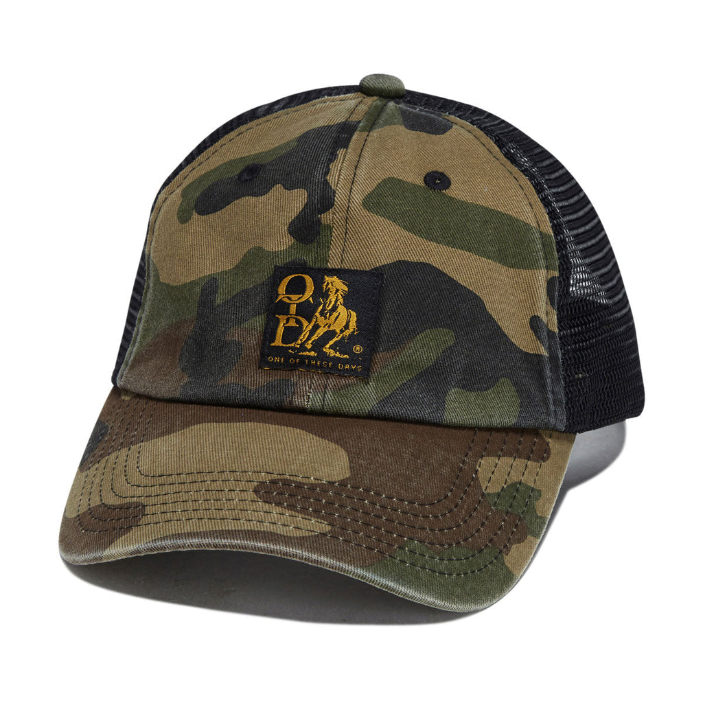 One Of These Days Woven Label Trucker Hat - Woodland Camo